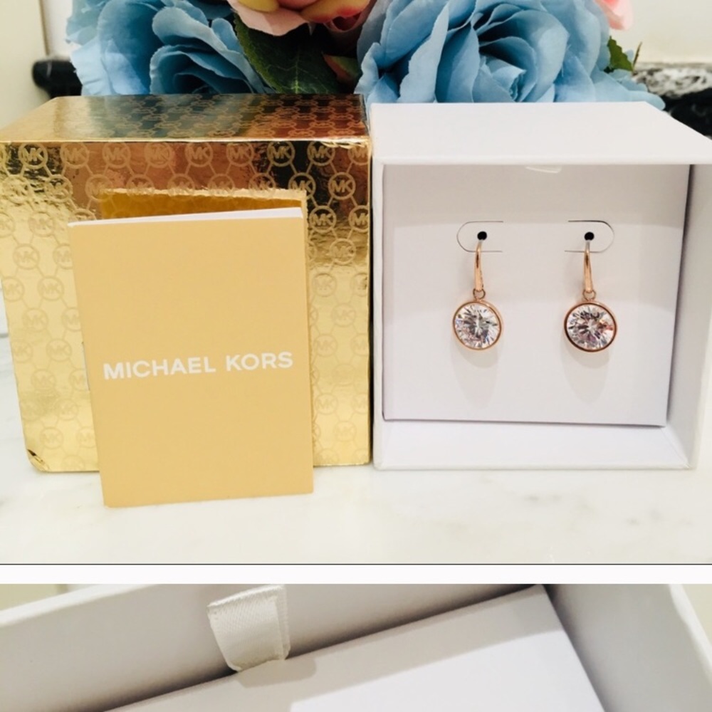 MK Rose gold earrings.